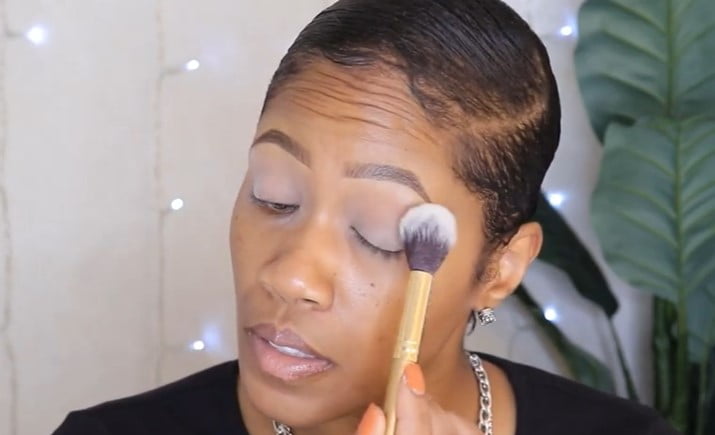 Eyeshadow stamps: step 2, grab your powder brush and lightly go over your lid