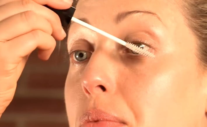 Mascara that helps lashes grow: step 2, brush the serum over your eyelashes
